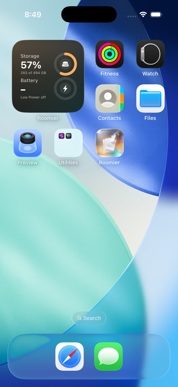 iPhone home screen with the Roomier widget showing storage and battery rings